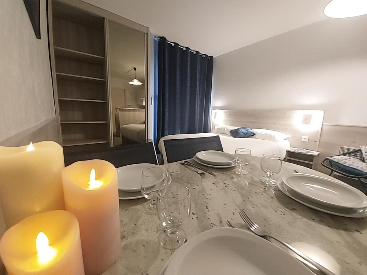 Coin salon dans l'établissement Hôtel-Résidence Le Lys