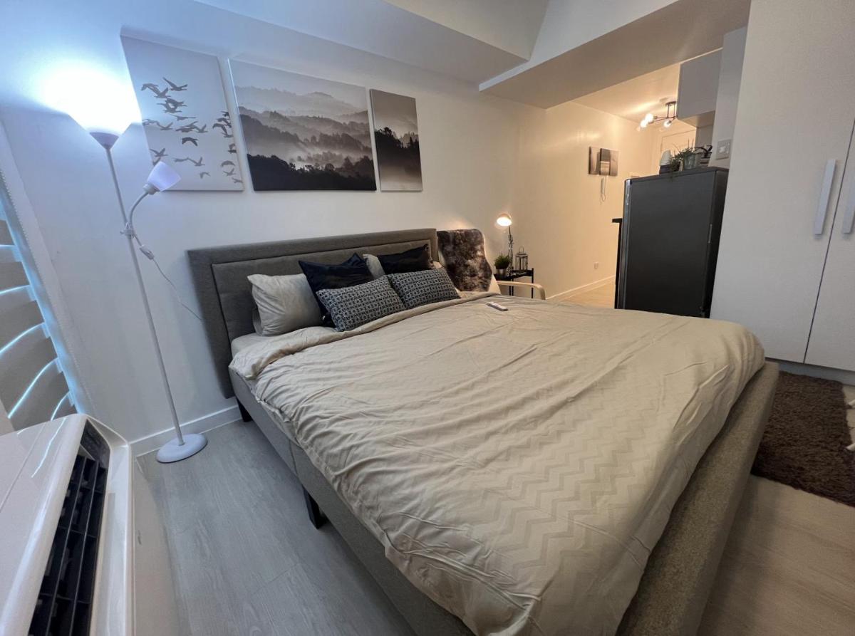 Modern Staycation Studio at Azure North Pampanga - Housity