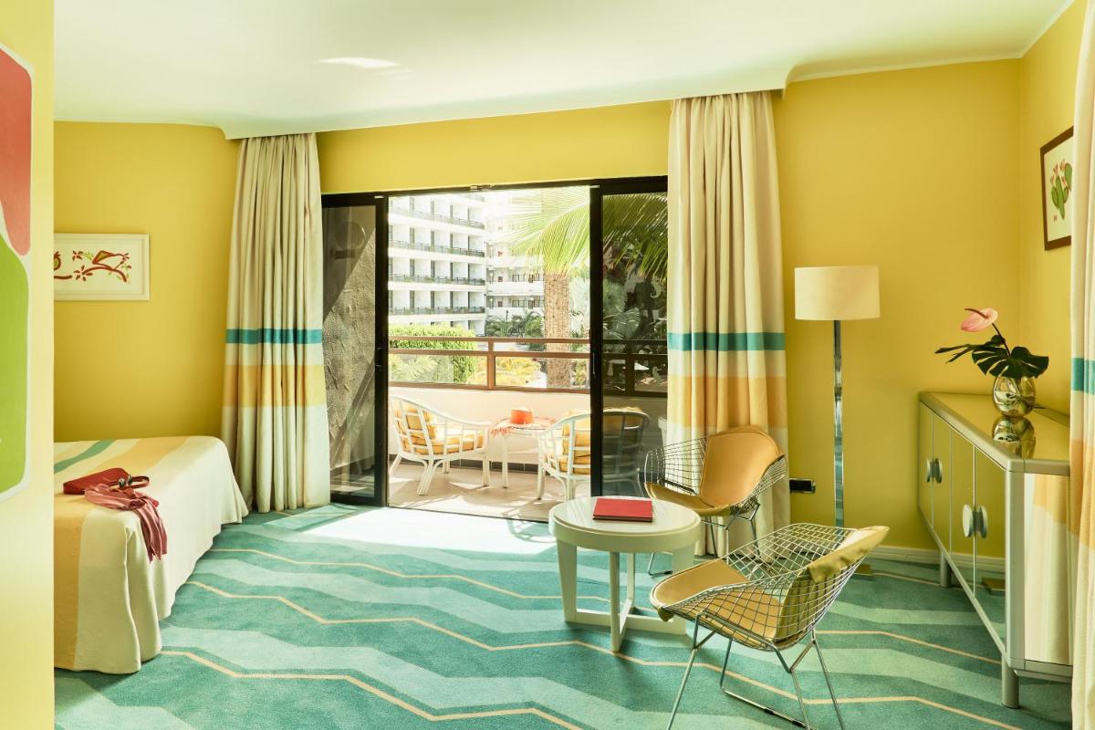 Cama o camas de una habitación en Seaside Palm Beach