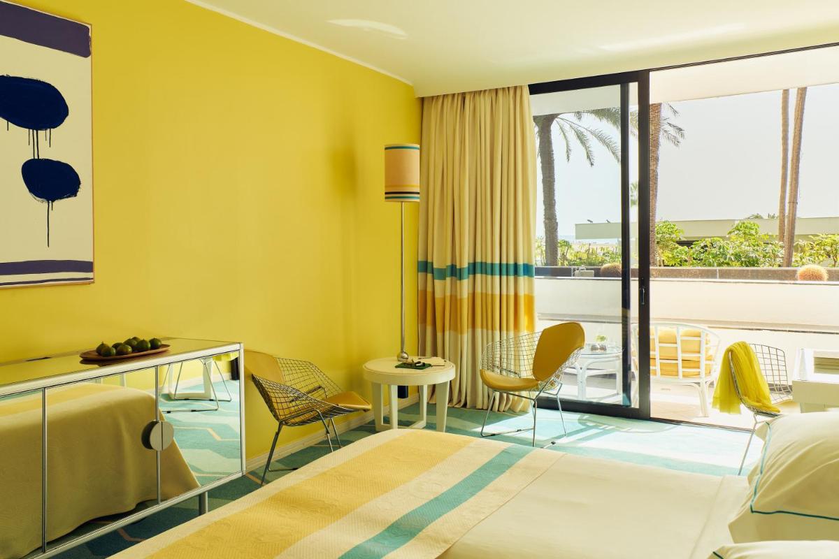 Cama o camas de una habitación en Seaside Palm Beach