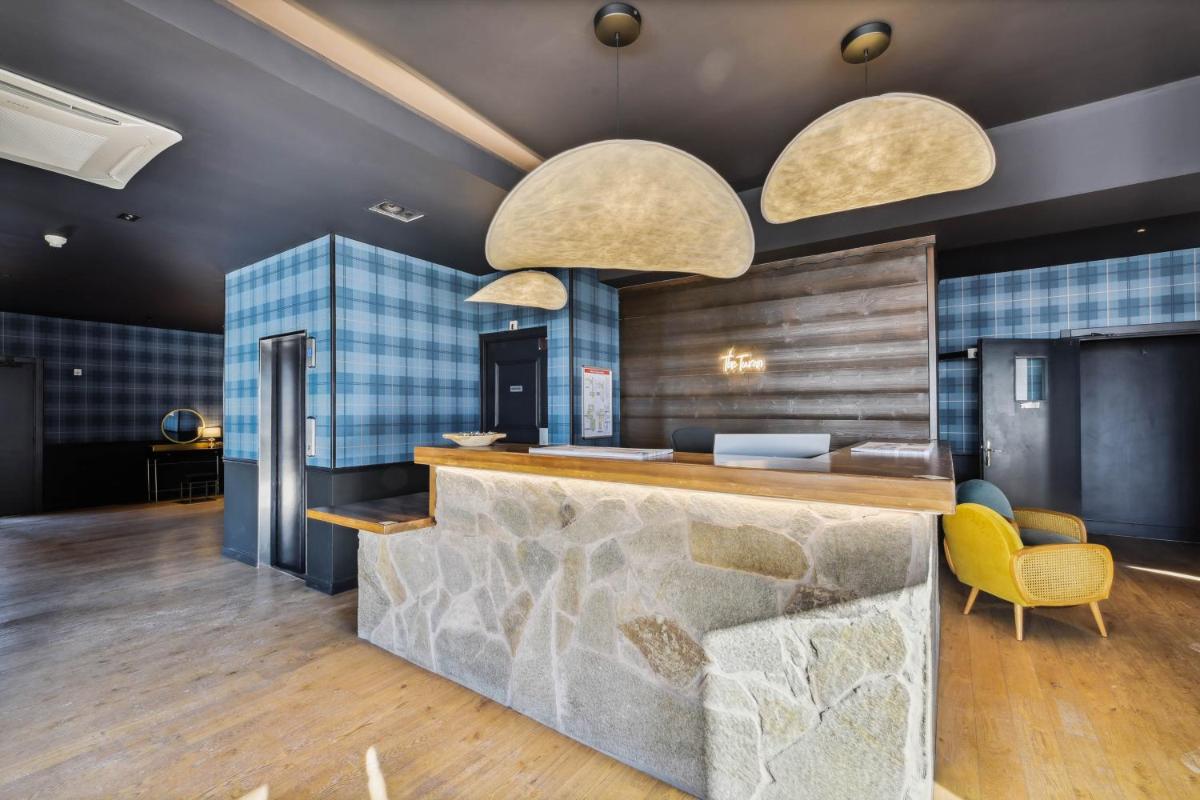 Coin salon dans l'établissement Hotel Turan & Spa