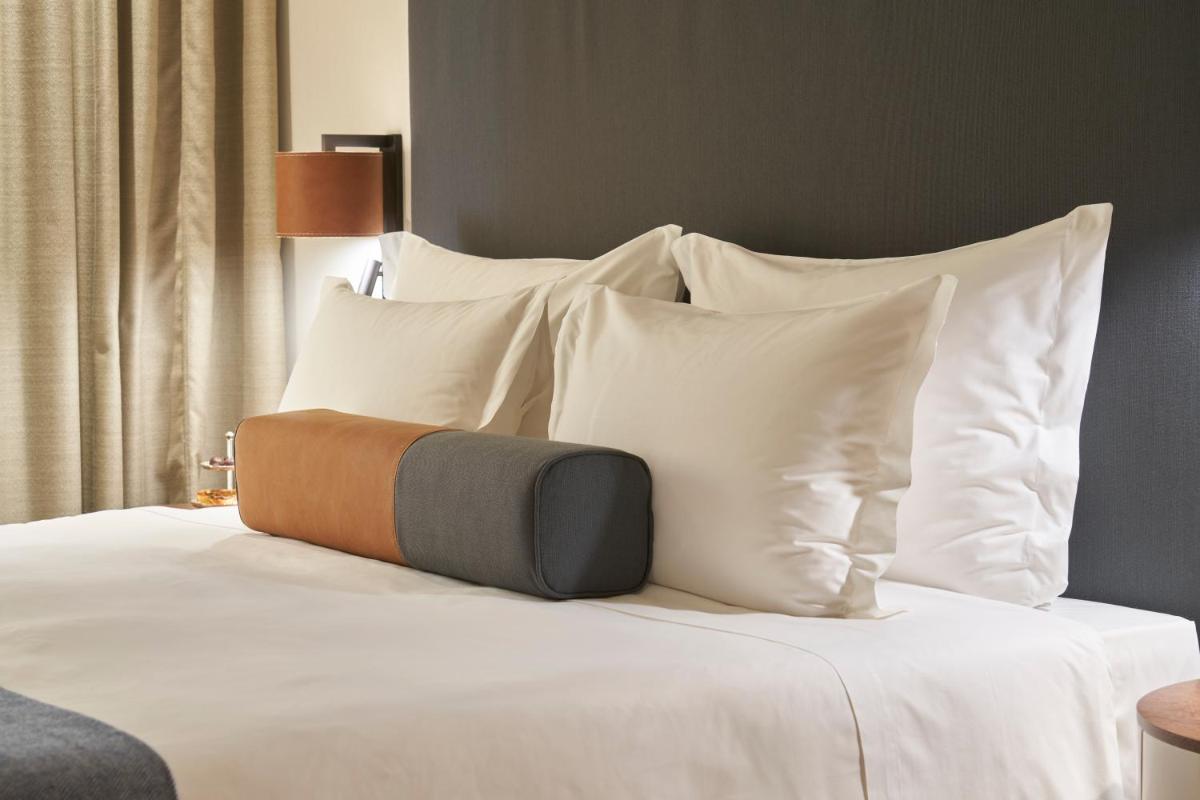 Uma cama ou camas num quarto em PortoBay Flores