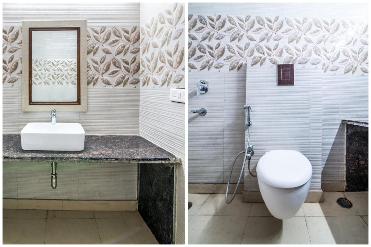 Capital O Hotel Orchid Garden Near Satyam Inox Patel Nagar - Housity