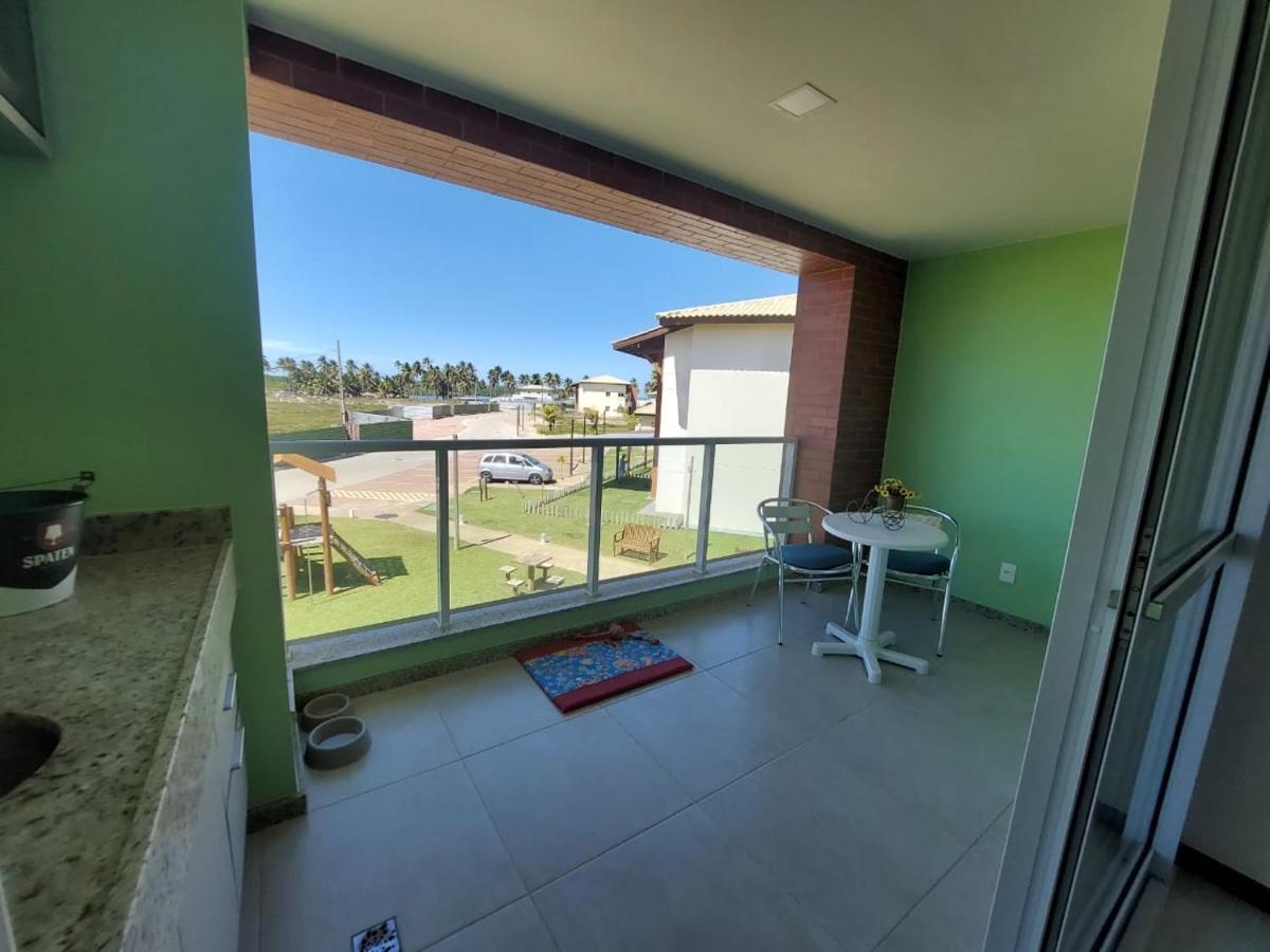 Condomínio local paradisíaco em frente à praia. - Housity