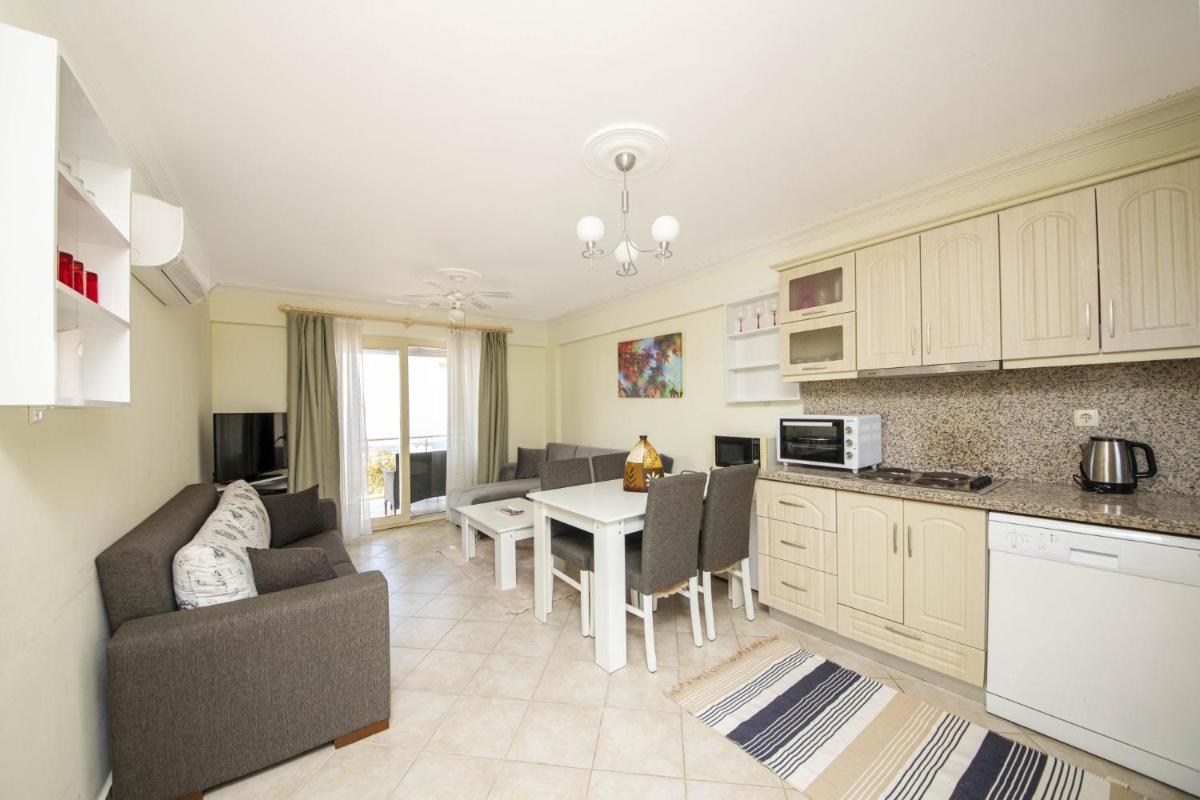 Sleek Flat with Private Beach and View in Milas - Housity