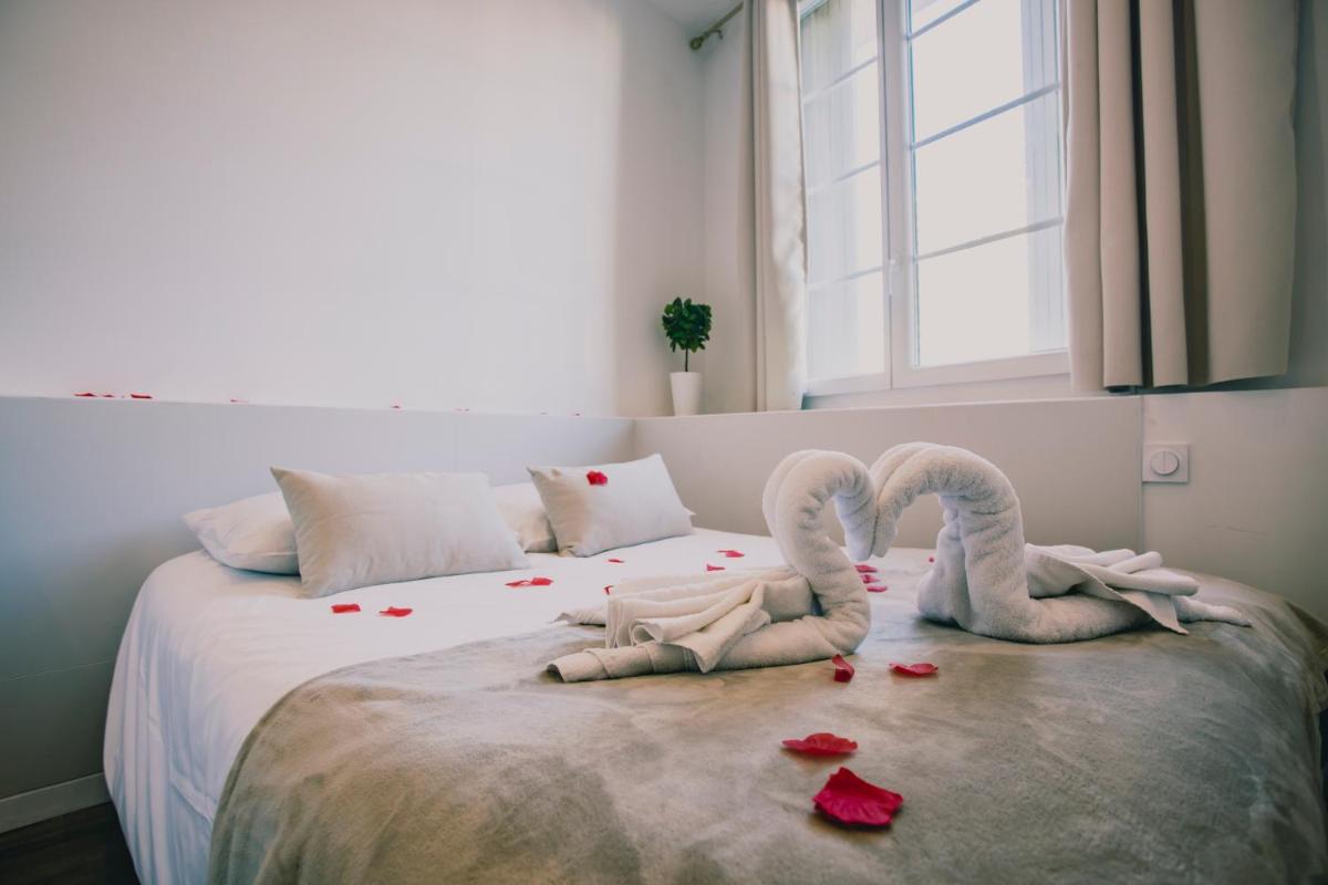 Escapade en Amoureux T2 luxueux, Love Room avec balnéo, 60m gare - hypercentre - La Porte Bleue 4 - Housity