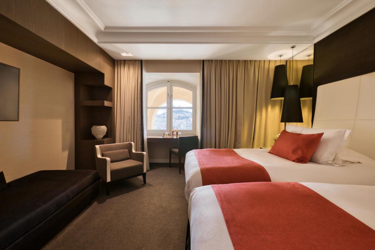 Un ou plusieurs lits dans un hébergement de l'établissement InterContinental Marseille - Hotel Dieu by IHG