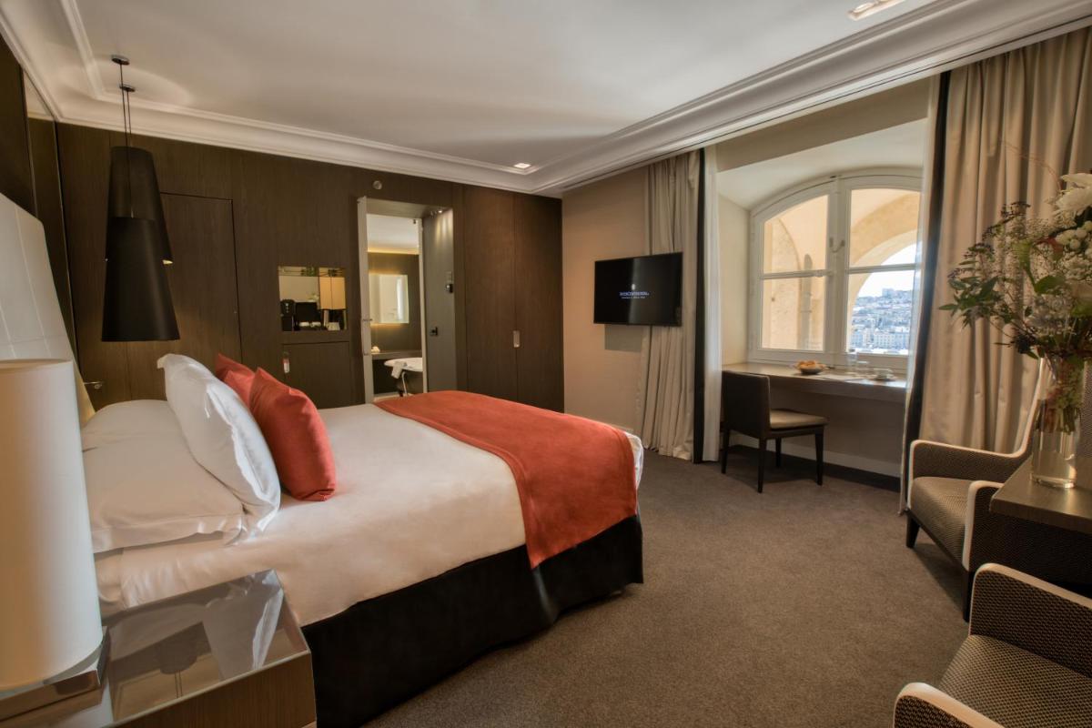 Un ou plusieurs lits dans un hébergement de l'établissement InterContinental Marseille - Hotel Dieu by IHG