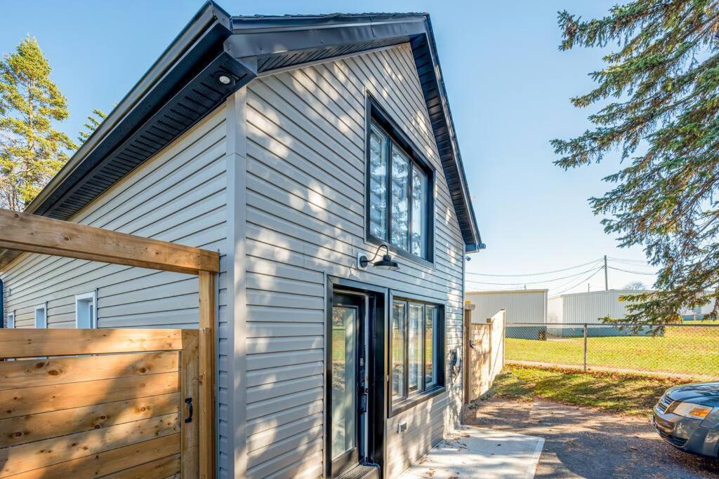 Kingsdale Designer Tiny House with Tesla Charger - Housity