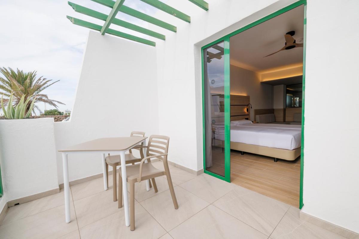 Cama o camas de una habitación en MYND Yaiza