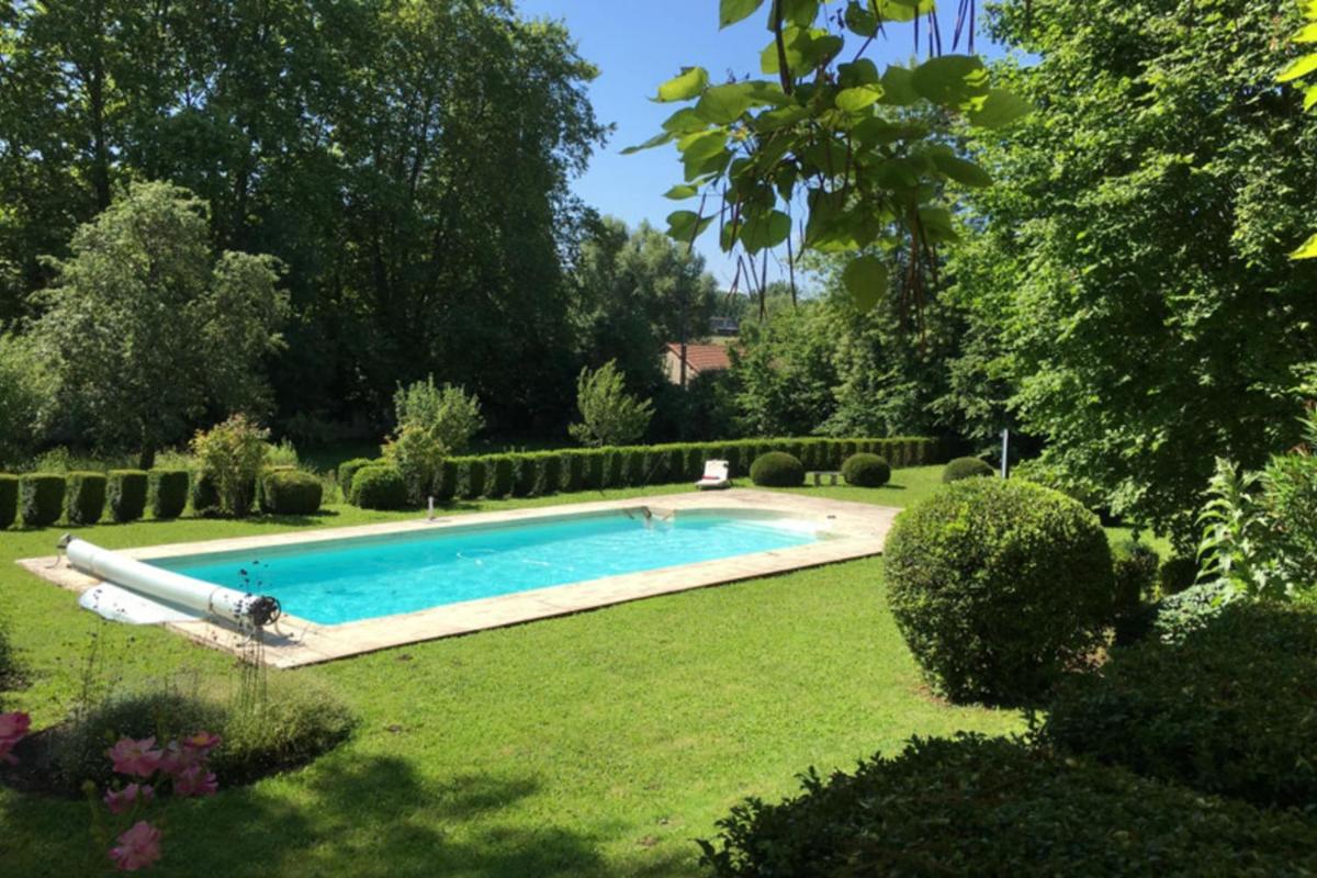 Charming 14th Century Village Chateau with gardens and outdoor heated pool - Housity
