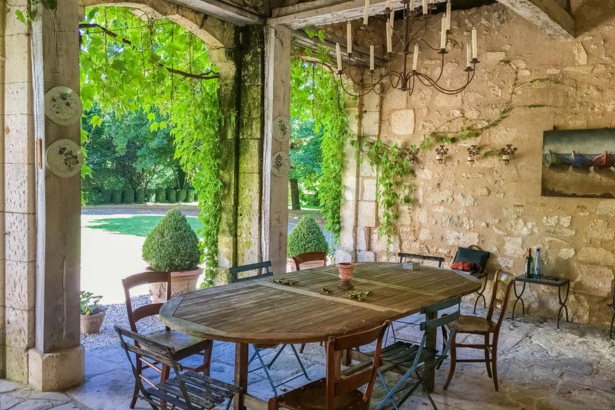 Charming 14th Century Village Chateau with gardens and outdoor heated pool - Housity