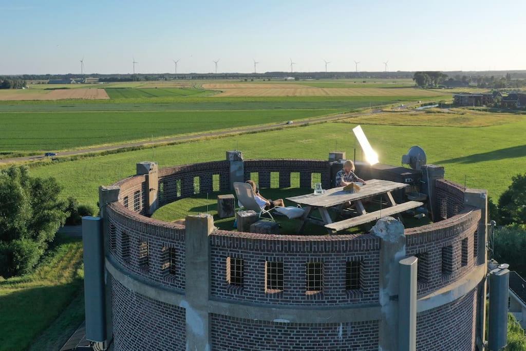 Verblijf boven in de watertoren van Strijen met dakterras - Housity