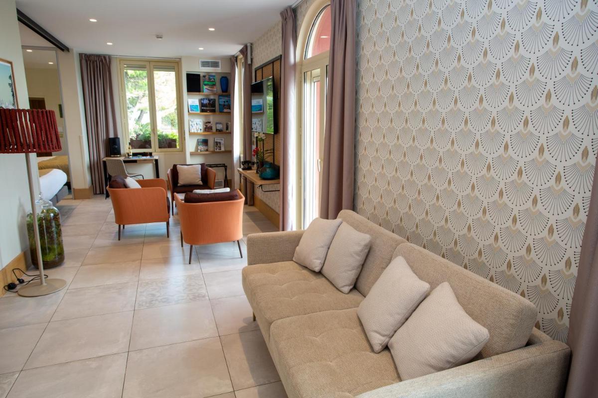Coin salon dans l'établissement Splendid Hôtel & Spa