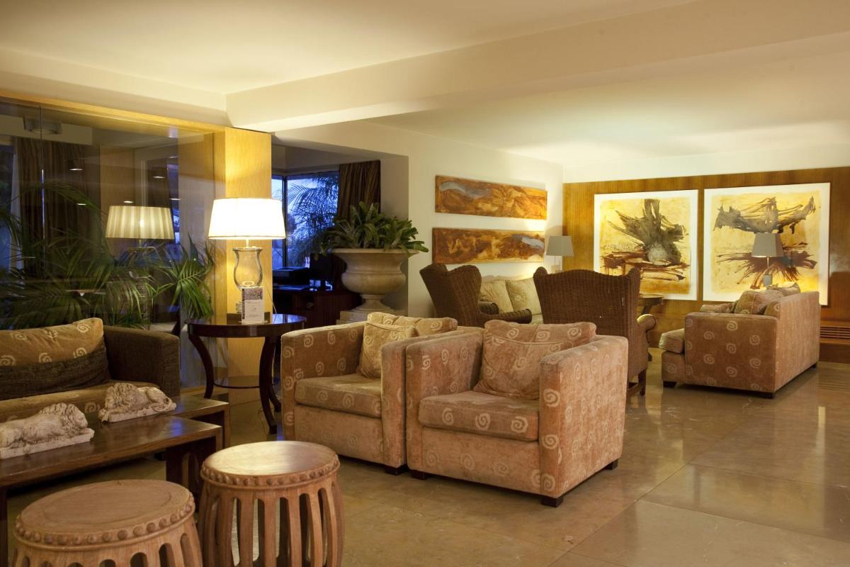 Uma área de estar em Santana Hotel & SPA