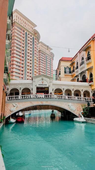 Suitetrails - NEW Modern Venice Best View and Balcony, Fast Wifi at McKinley Hill 1BR interconnected to Venice Grand Canal Mall