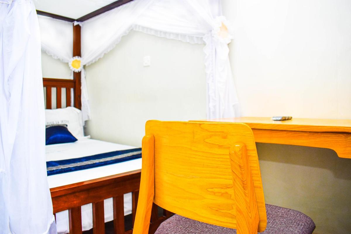 Dahlia Hotel and Accommodation - Housity