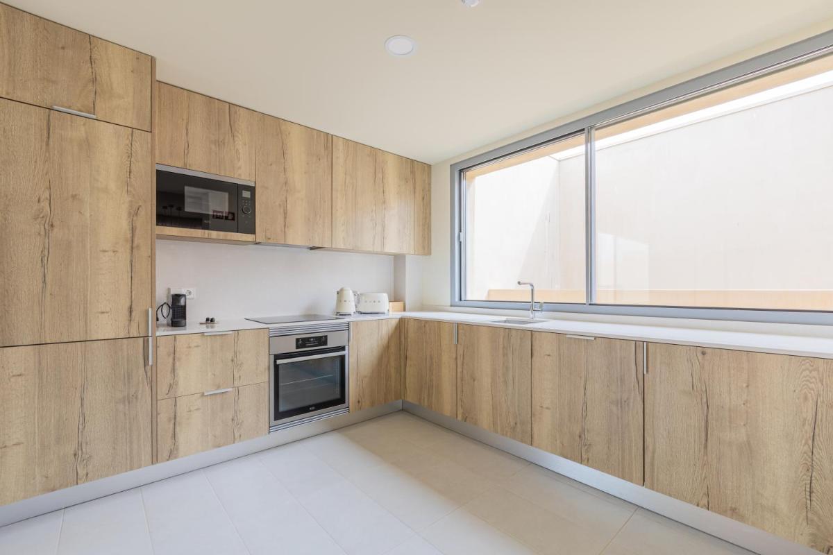 A cozinha ou kitchenette de White Shell Beach Villas