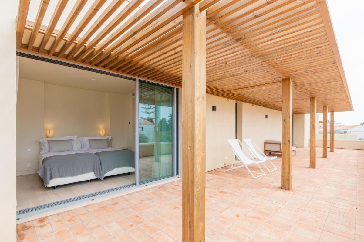 Uma área de estar em White Shell Beach Villas