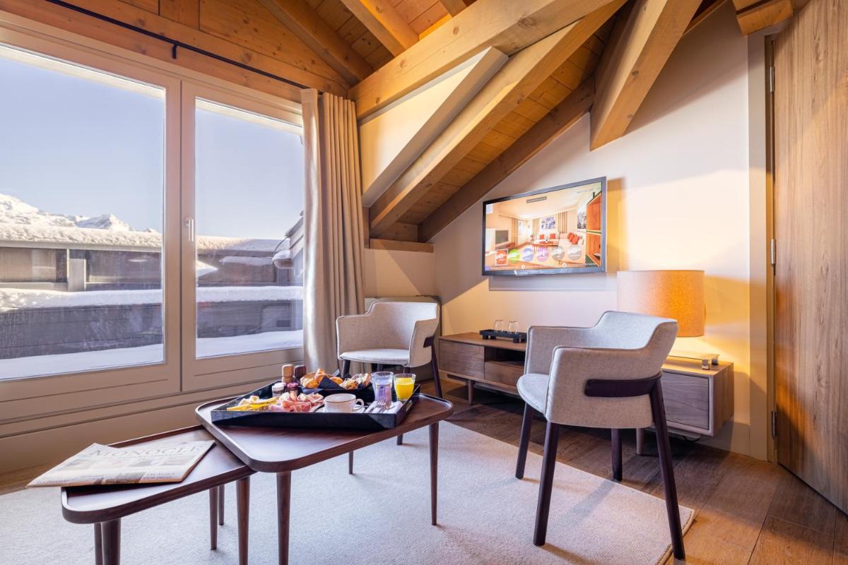 Coin salon dans l'établissement Les Suites de la Potinière