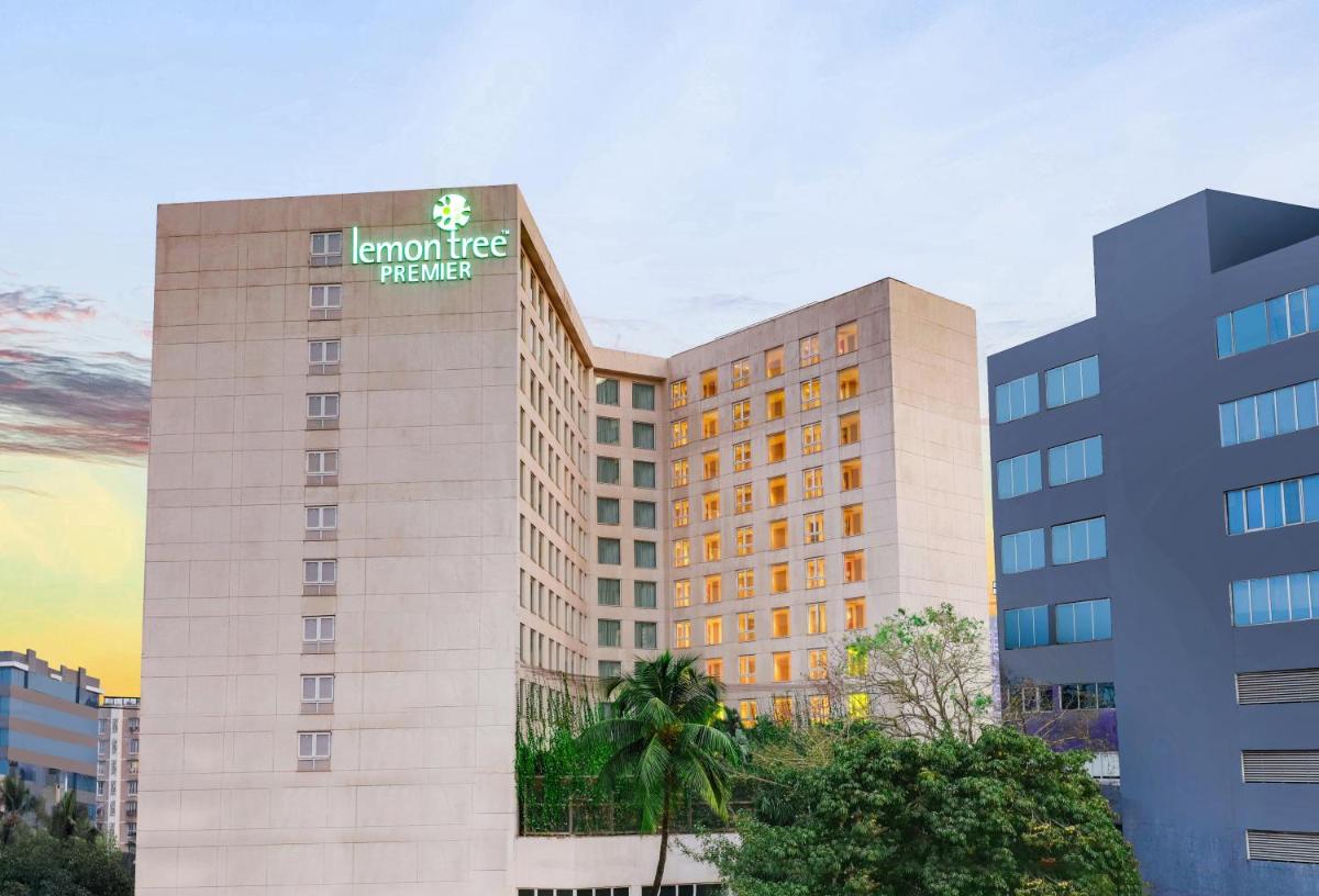 a hotel building with a sign on it at Lemon Tree Premier, Mumbai International Airport in Mumbai