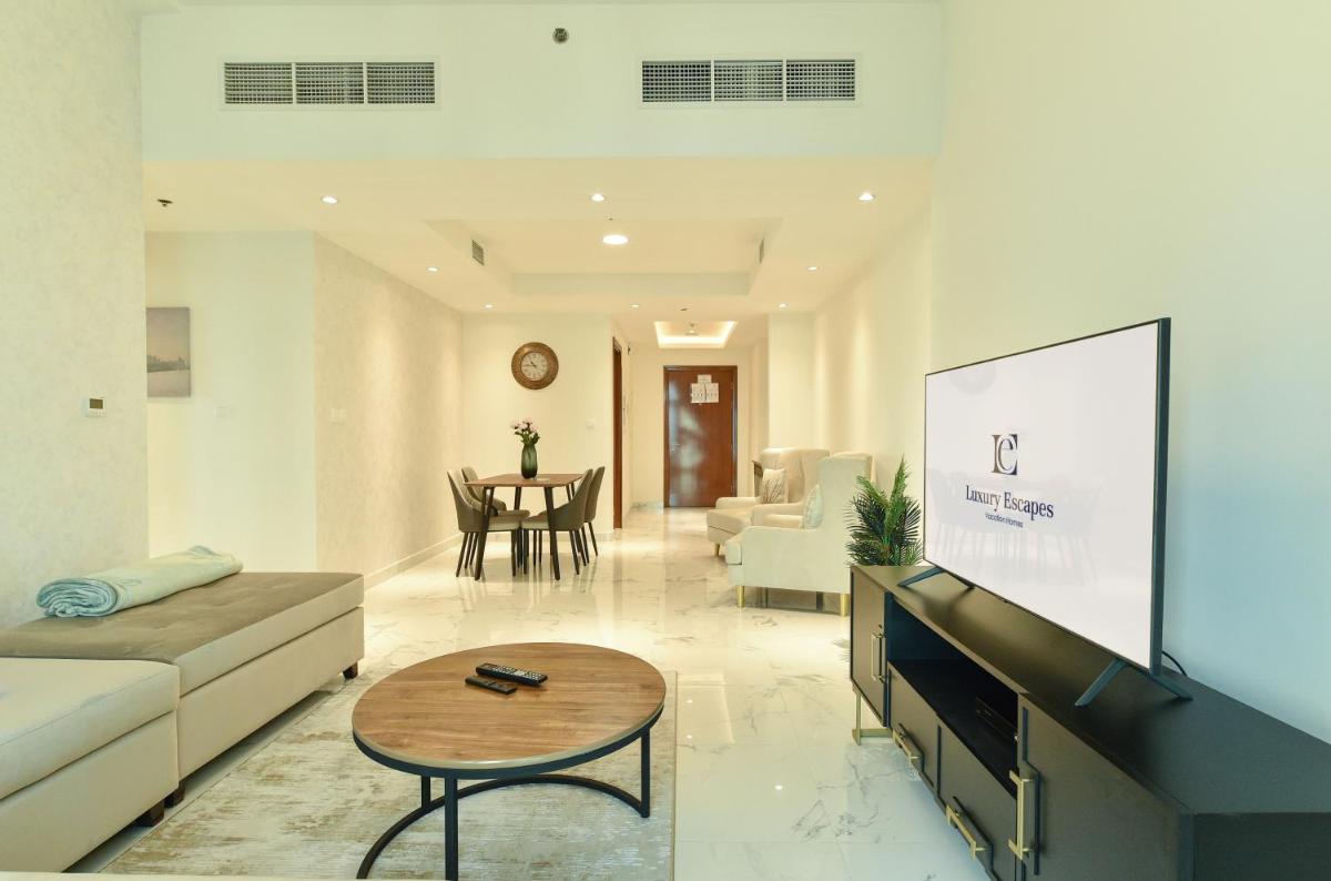 Luxury Escapes - View of Canal & Burj Khalifa 1BR Large Premium Apt - Amna Tower - Housity