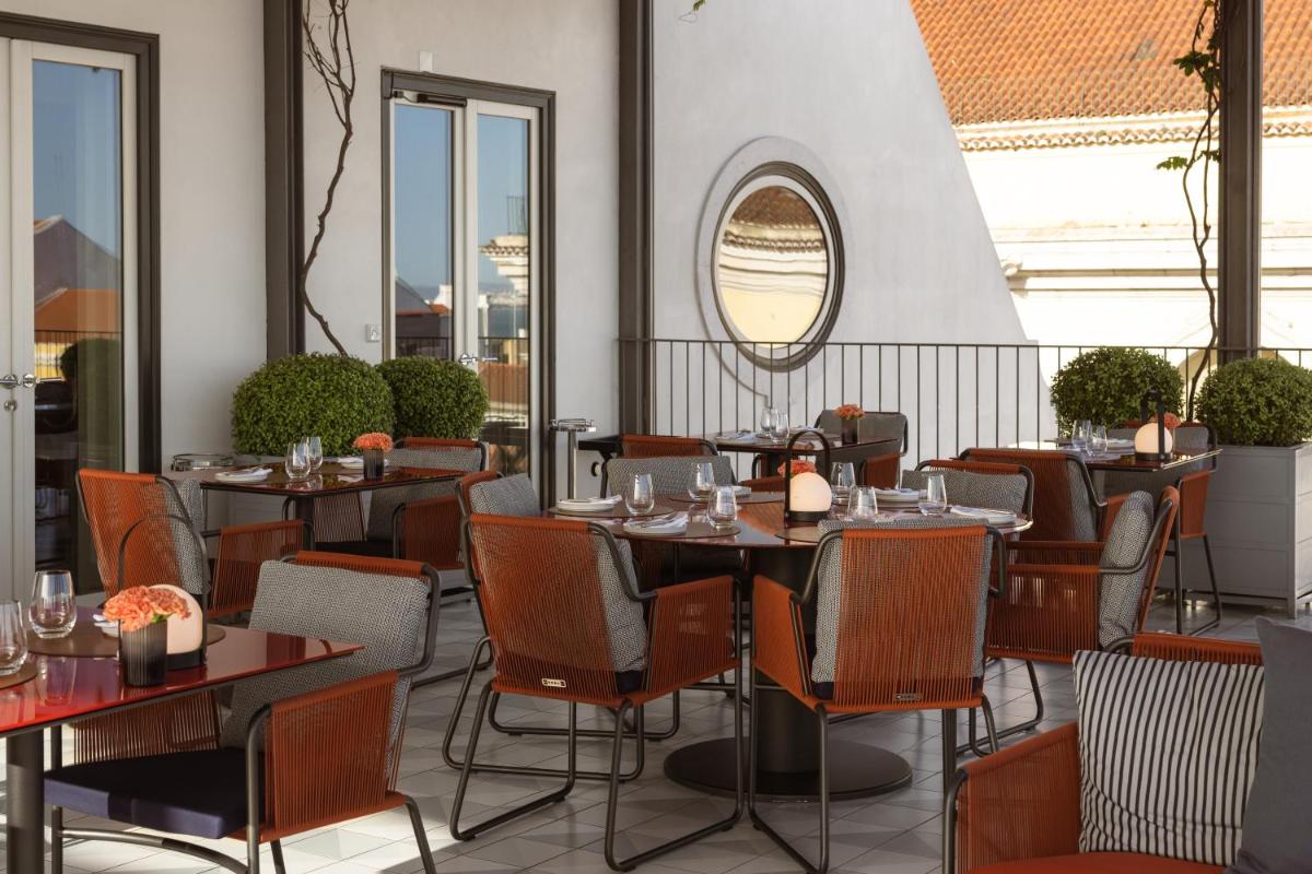 Uma área de estar em Bairro Alto Hotel