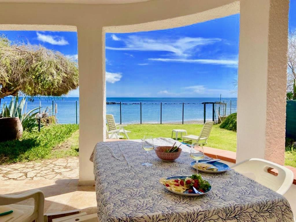 Paradise Beachfront Villa, Porto Columbu, Sardinia - Housity
