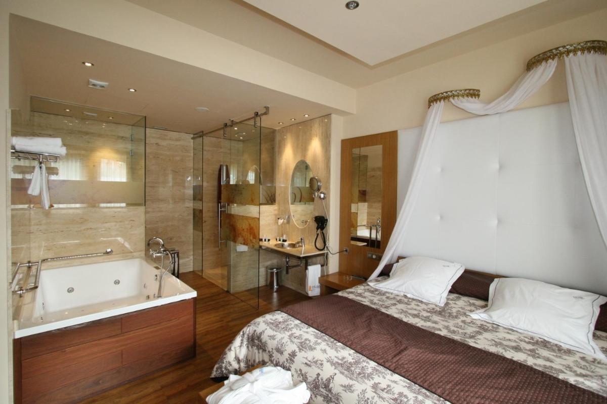 Cama o camas de una habitación en Hotel Felisa SPA