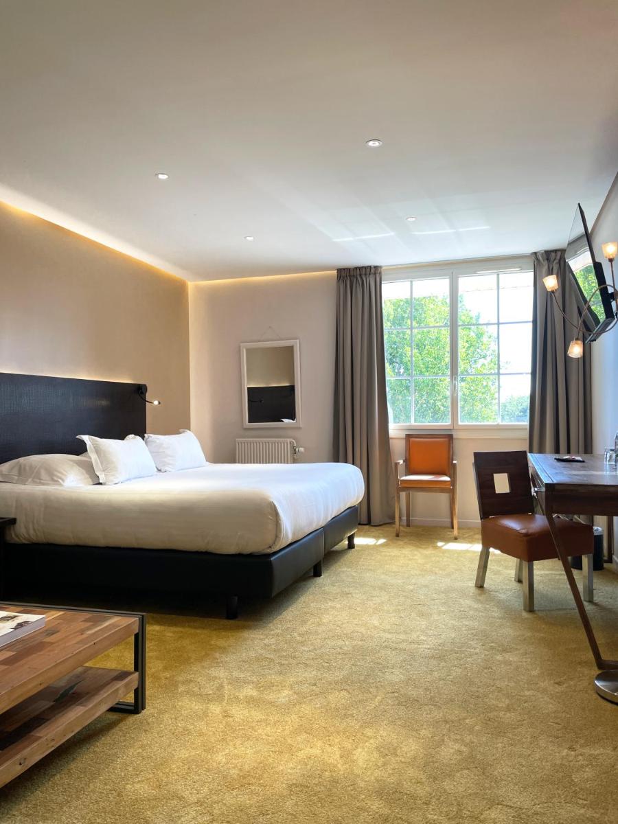 Un ou plusieurs lits dans un hébergement de l'établissement Le Grand Hôtel Le Touquet-Paris-Plage