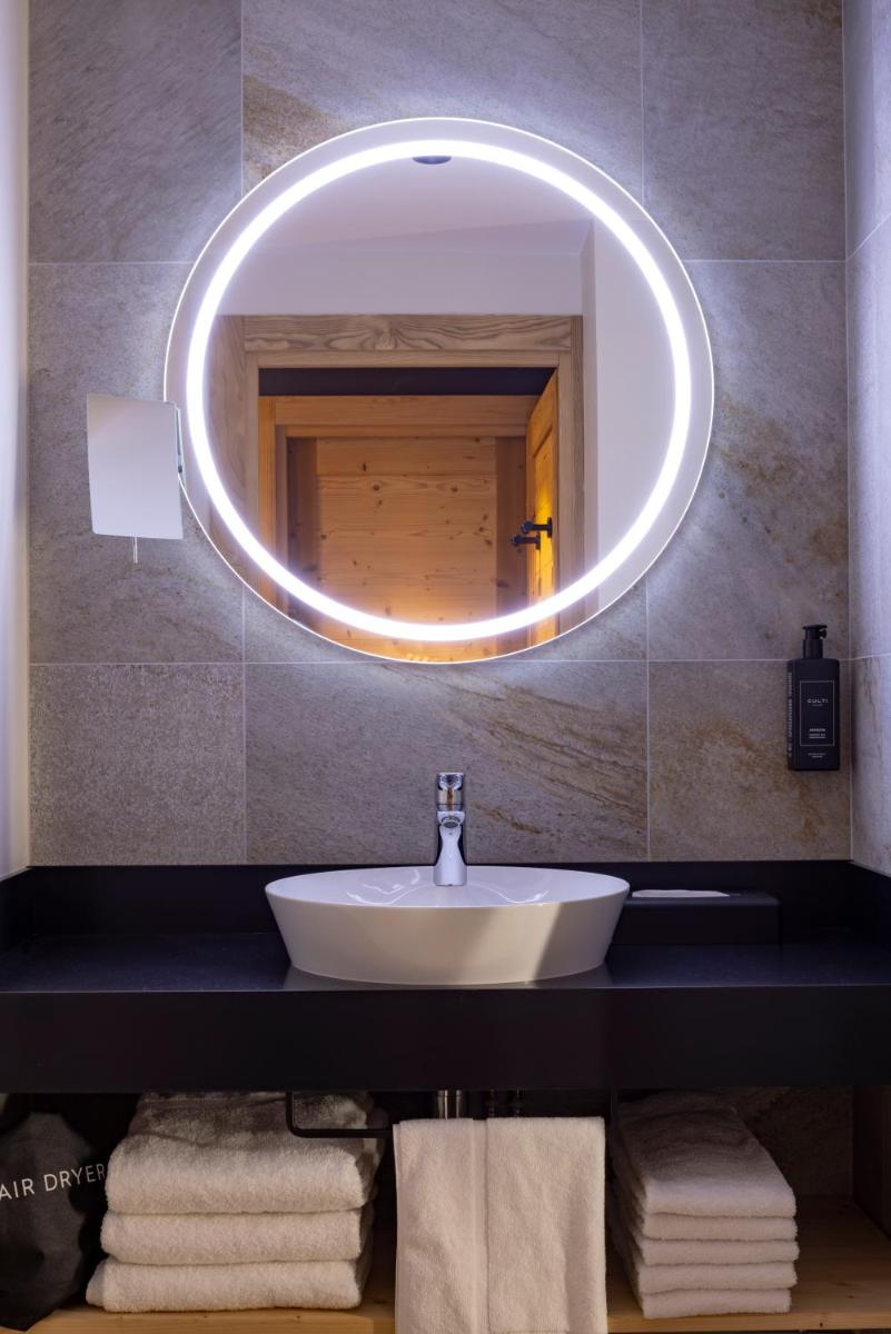 Salle de bains dans l'établissement HIGALIK HOTEL
