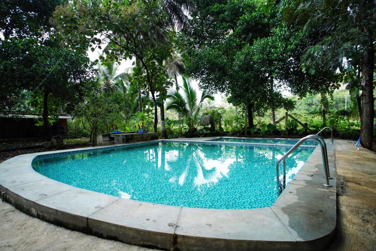 Suitetrails - Ambara Kovilakam Villa - Travent Mug
