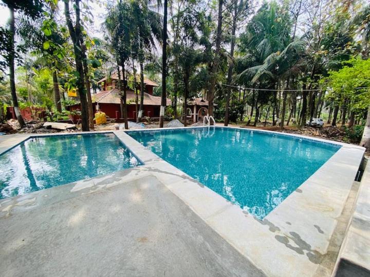Suitetrails - Ambara Kovilakam Villa - Travent Mug