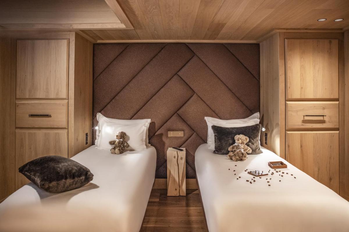 Un ou plusieurs lits dans un hébergement de l'établissement Armancette - The Leading Hotels of the World
