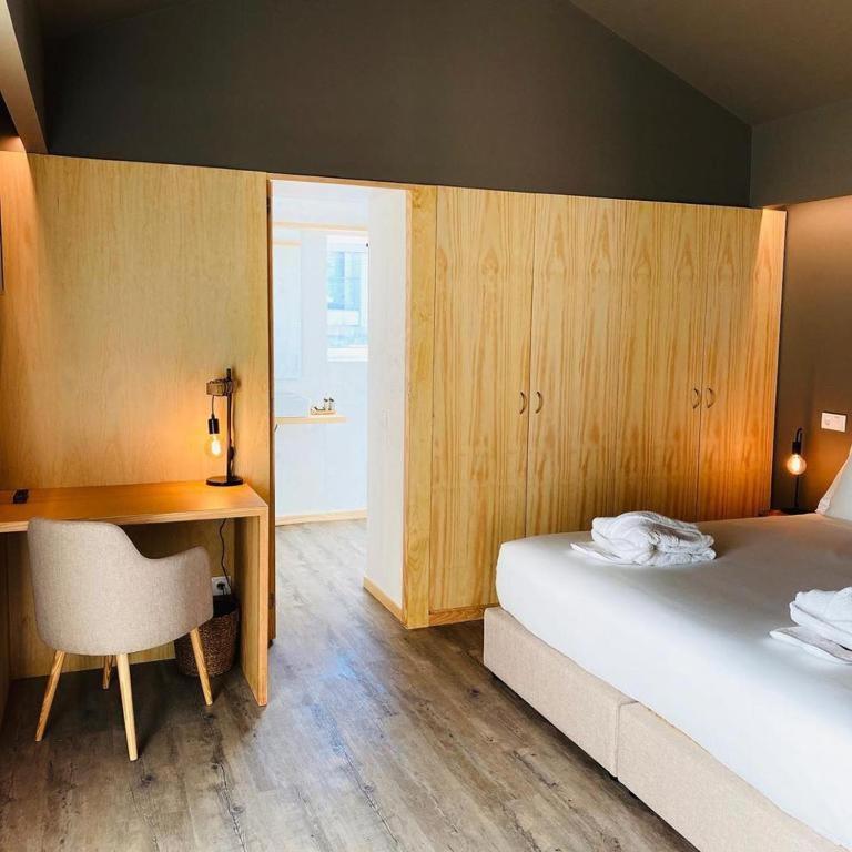 Uma cama ou camas num quarto em Quinta do Pedregal Hotel & Spa