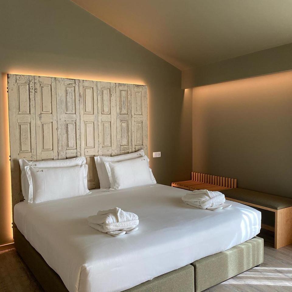 Uma cama ou camas num quarto em Quinta do Pedregal Hotel & Spa