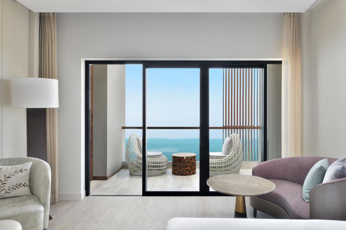 a living room with a view of the ocean at The Westin Resort & Spa Himalayas in Rishīkesh