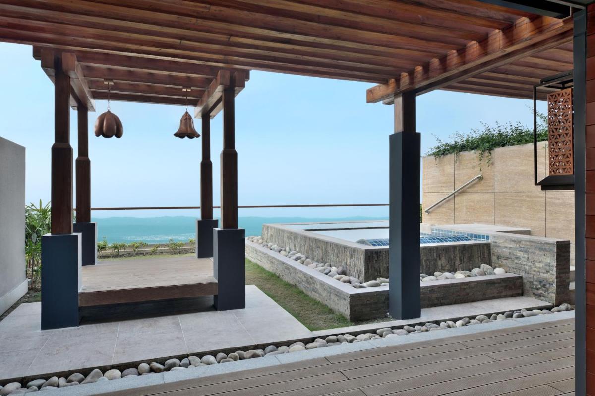 an outdoor patio with a view of the ocean at The Westin Resort & Spa Himalayas in Rishīkesh