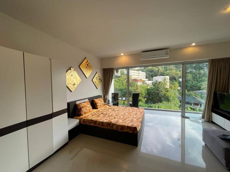Relax in Style at Our Karon Beach Condo - Housity