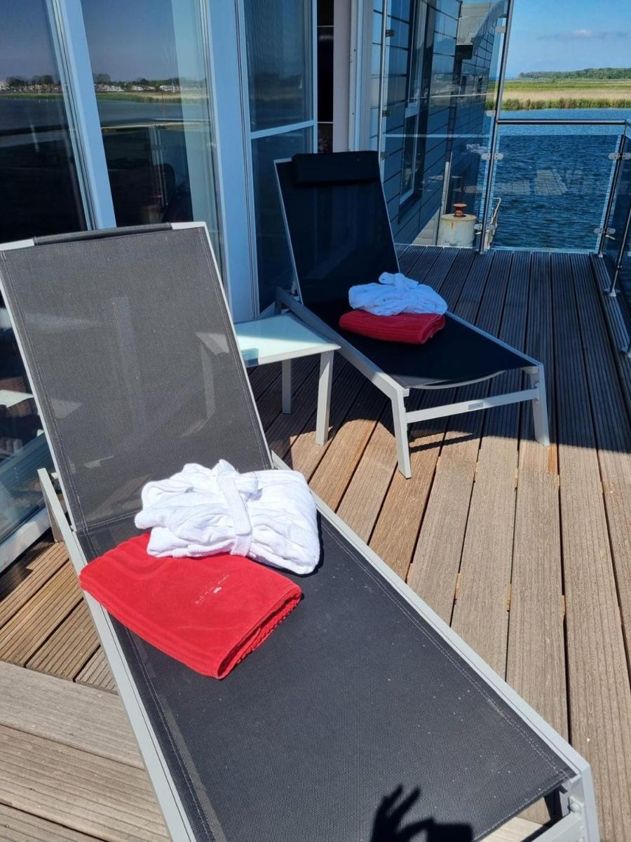 Ein Balkon oder eine Terrasse in der Unterkunft Schwimmende Häuser im BALTIC SEA RESORT