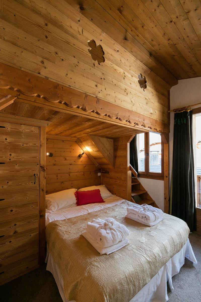 Un ou plusieurs lits dans un hébergement de l'établissement Hôtel et Chalet Au Coin Du Feu Chilly Powder