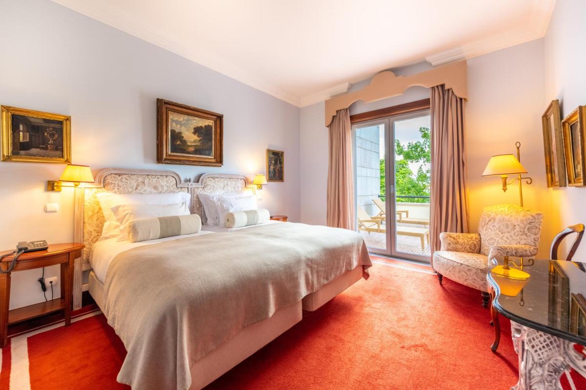Uma cama ou camas num quarto em Pestana Palace Lisboa Hotel & National Monument - The Leading Hotels of the World