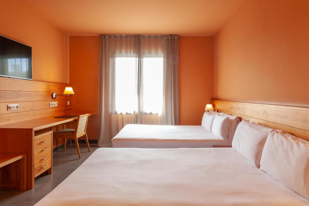 Cama o camas de una habitación en Montanyà
