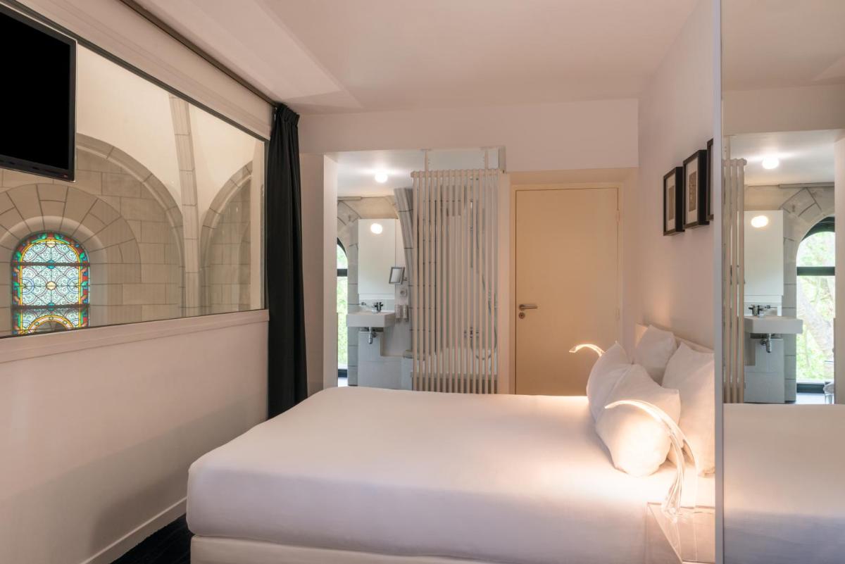 Un ou plusieurs lits dans un hébergement de l'établissement SOZO Hotel