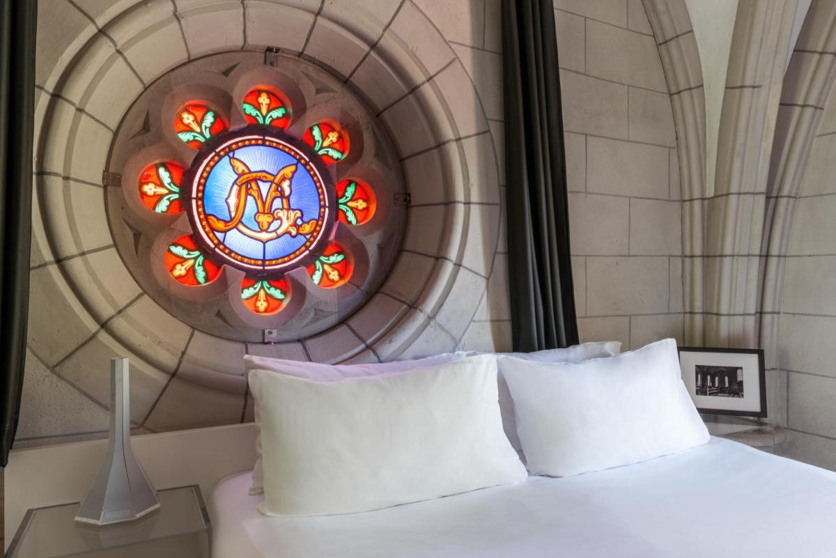 Un ou plusieurs lits dans un hébergement de l'établissement SOZO Hotel