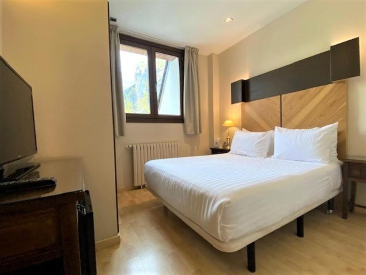 Cama o camas de una habitación en Silken Ordesa