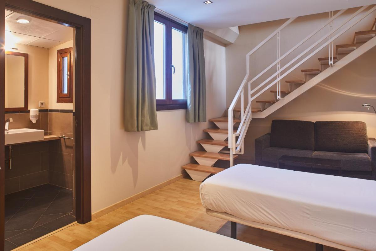 Cama o camas de una habitación en Silken Ordesa