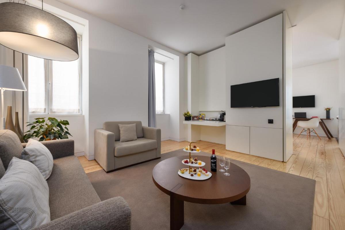 Uma televisão e/ou sistema de entretenimento em Inspira Liberdade Boutique Hotel
