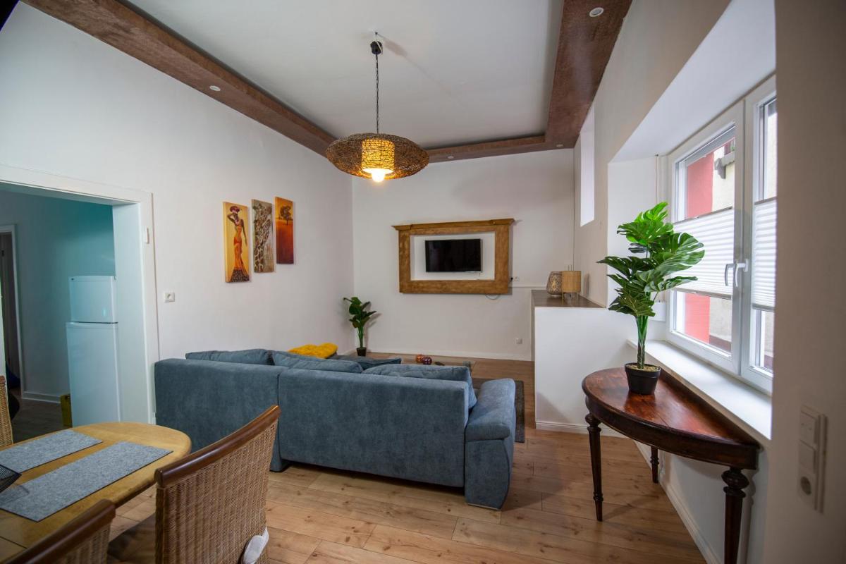 Apartment mit kleinem Innenhof im Erdgeschoss für bis zu 4 Personen - Housity