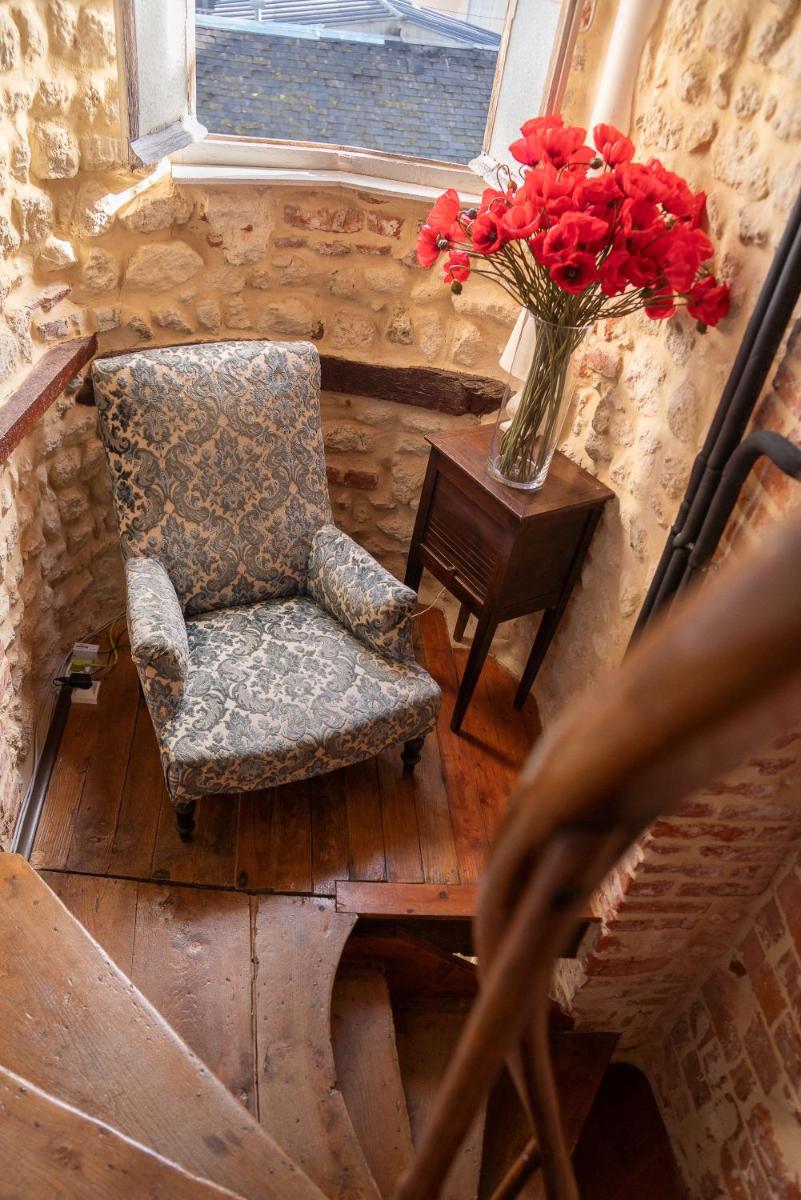 Coin salon dans l'établissement TOWNHOUSE TROUVILLE - Appart'Hotel & Studios